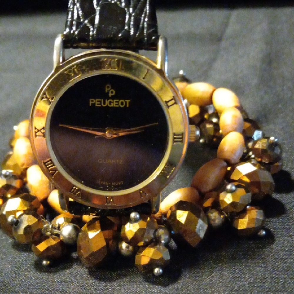 Peugeot Gold and Black Watch with Beaded Bracelets